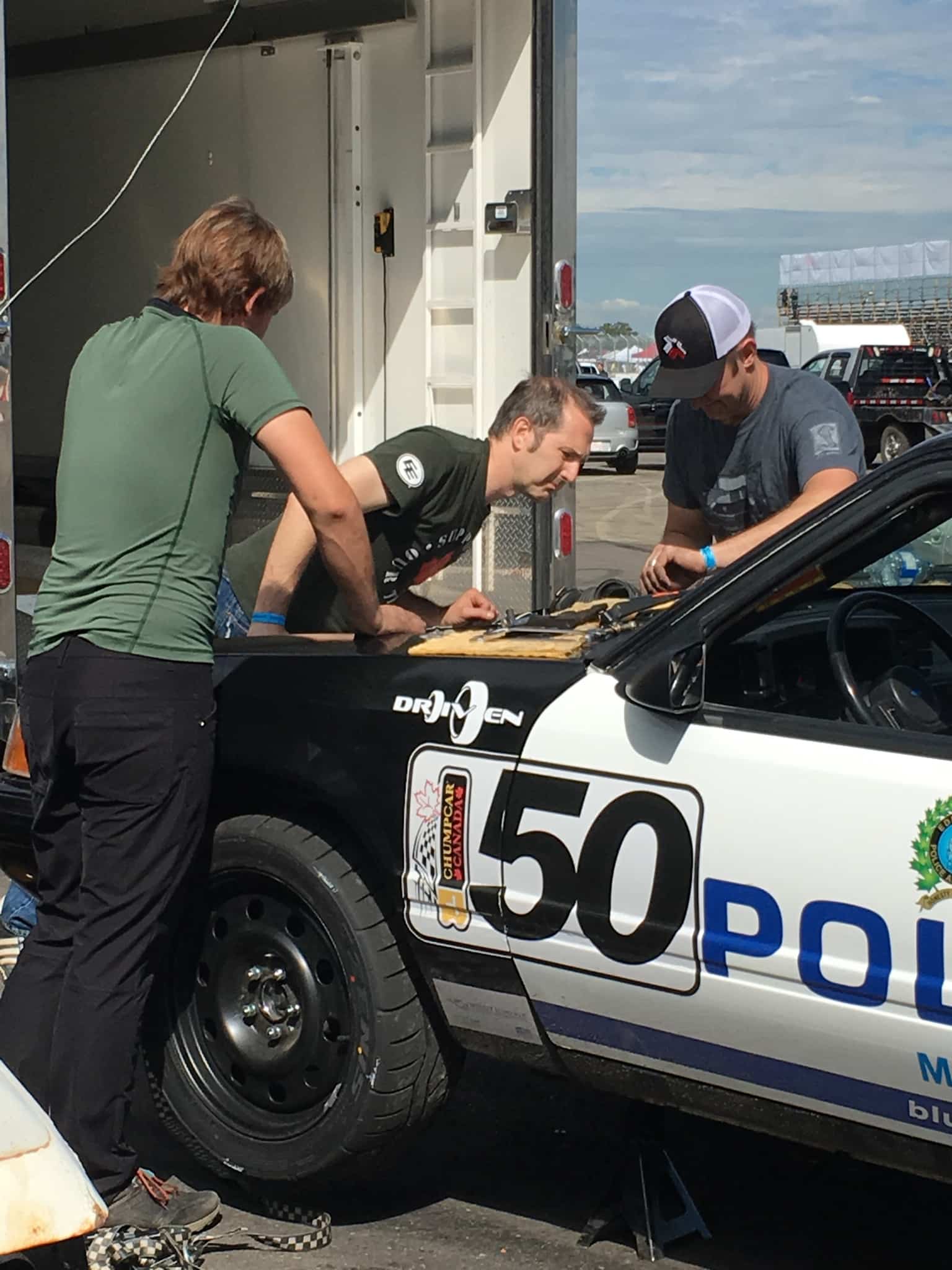 fixing the race car